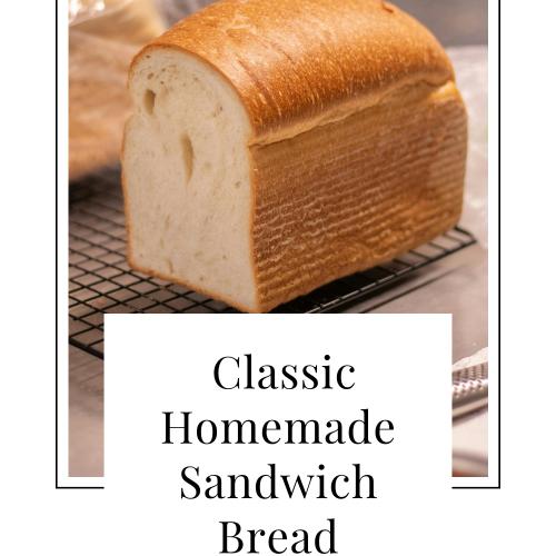 Loaf of sandwich bread with overlaid text “Classic Homemade Sandwich Bread”.